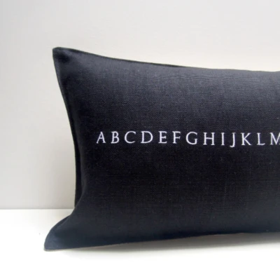 BLACK ALPHABET PILLOW